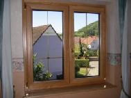 fenêtre alu bois croisillons laiton